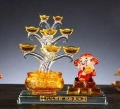 cây tụ bảo và thần tài